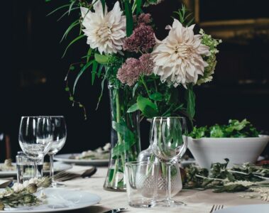 white and brown flowers on white table